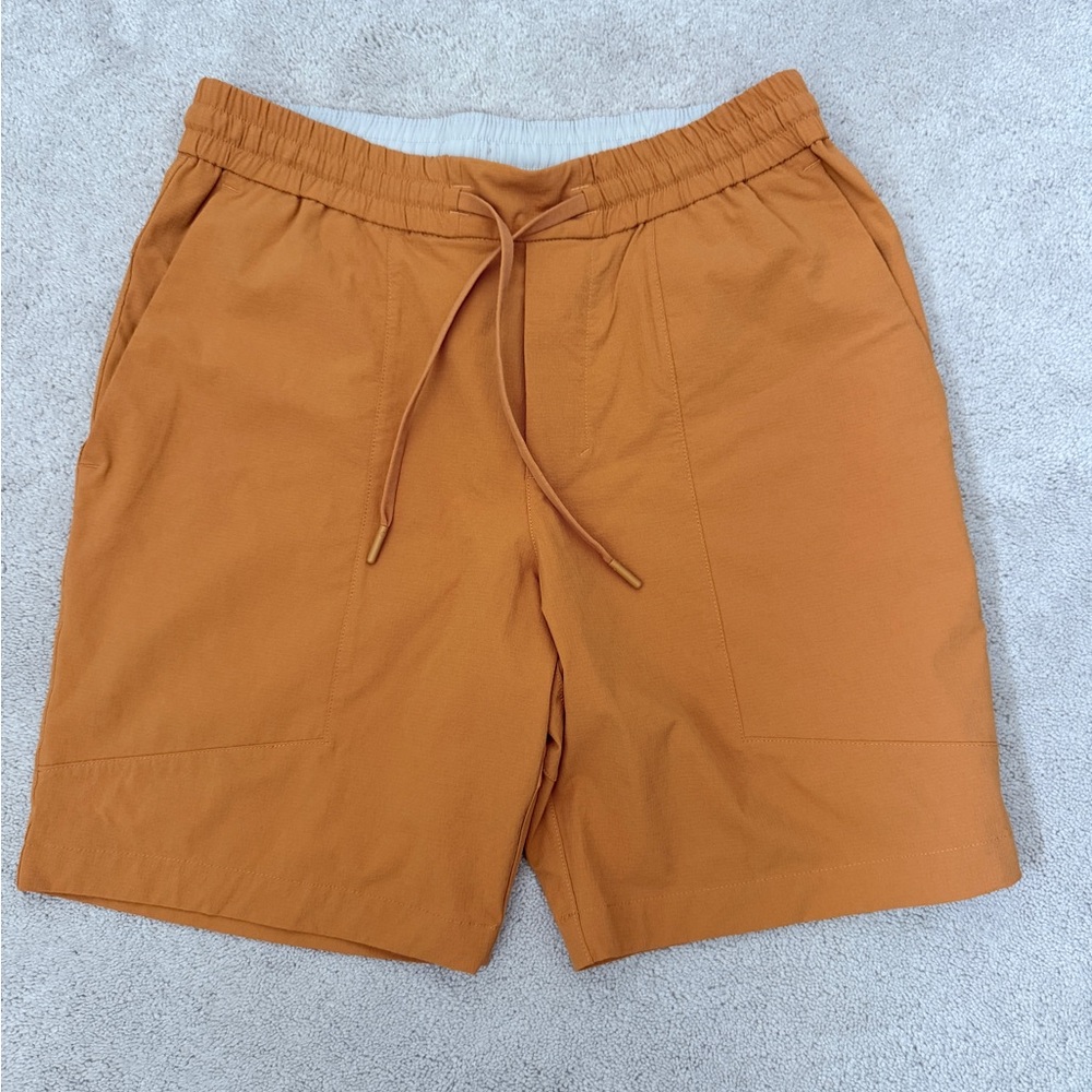 Men's orange Lululemon shorts medium